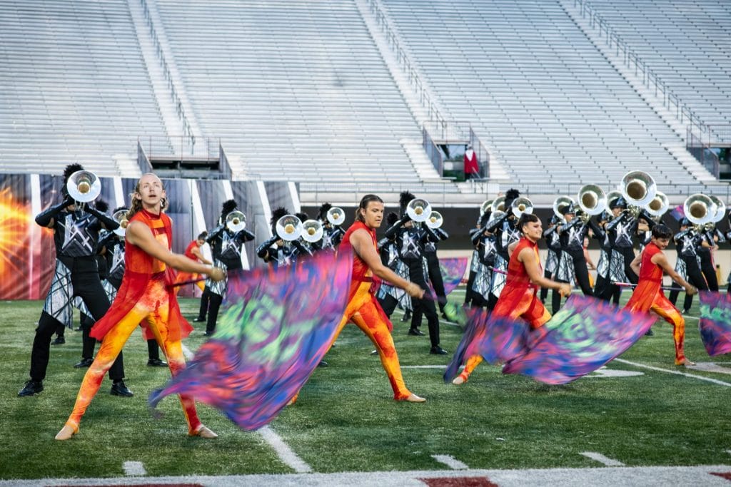 drum corp performs at Huskie Stadium