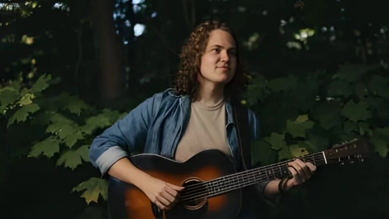 Sam Robbins playing guitar